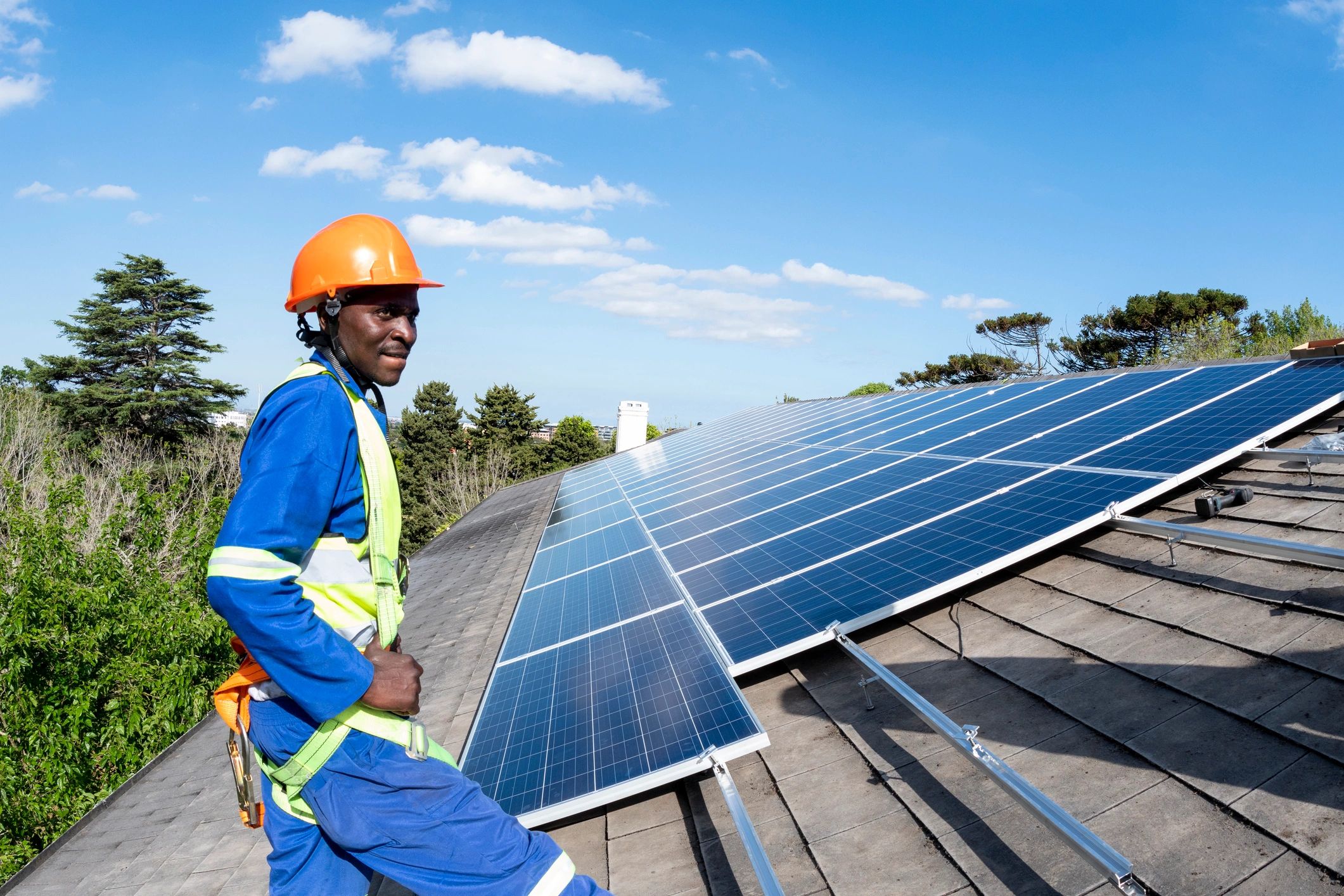 Solar installation team working on a rooftop system